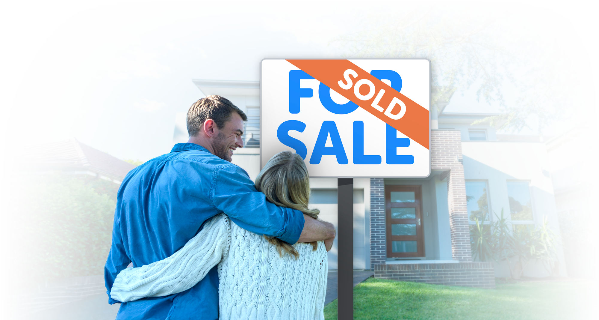 Couple in front of a house with a For Sale sign marked Sold